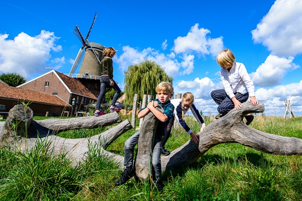 Children play in the OERR playground near the Hompesche Mill